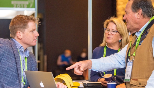 Photo of Clear Grain Exchange team and customers having a discussion