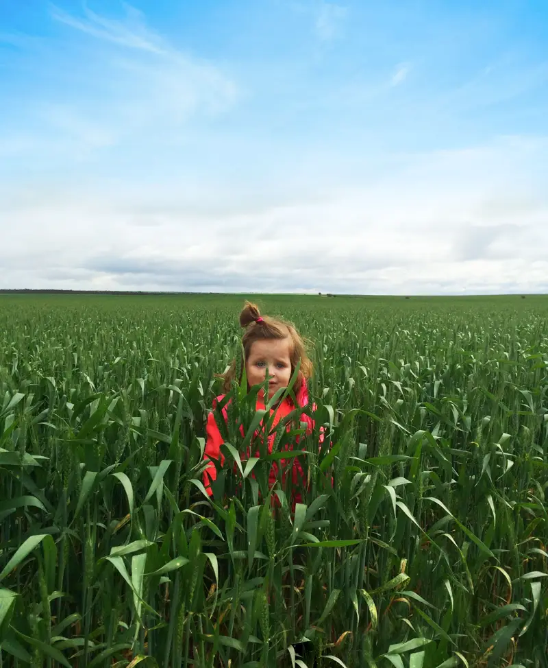 Girl standing in field