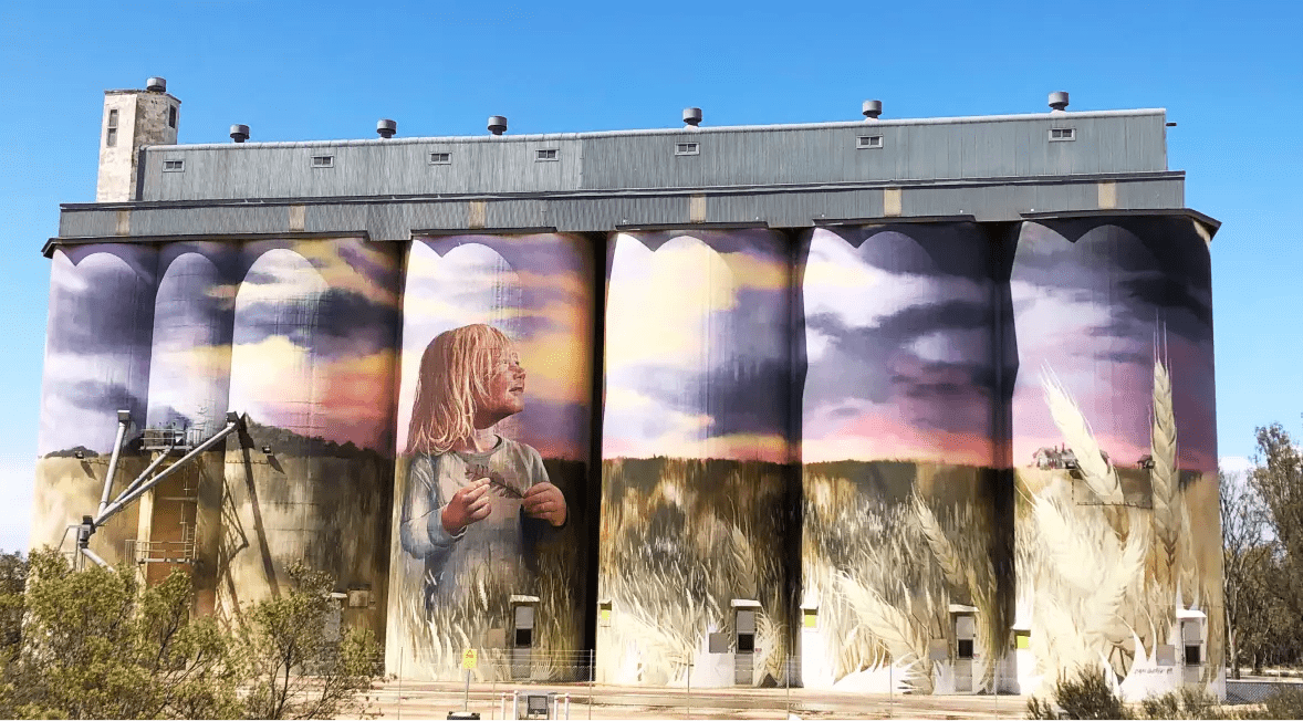 Photo of Australian warehouse grain silos with painted mural
